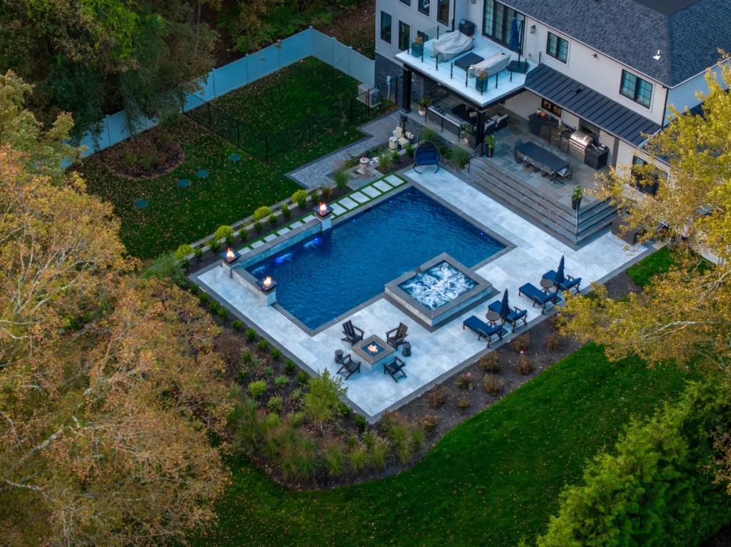 Illuminated custom pool designed for evening entertaining in Alpharetta