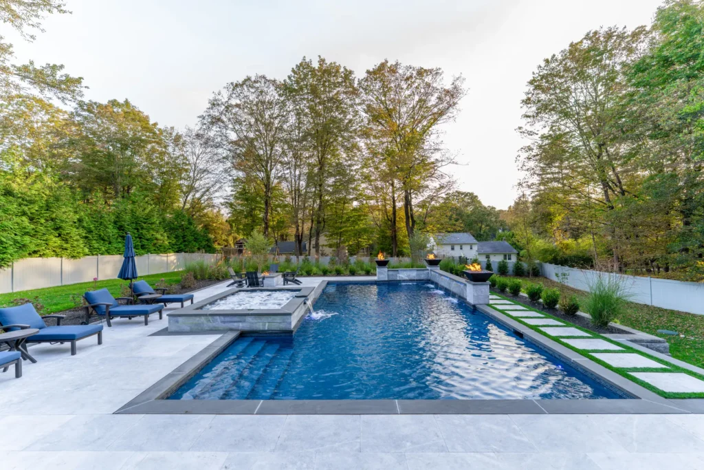 Porcelain pool deck and landscaped entertaining space in Alpharetta