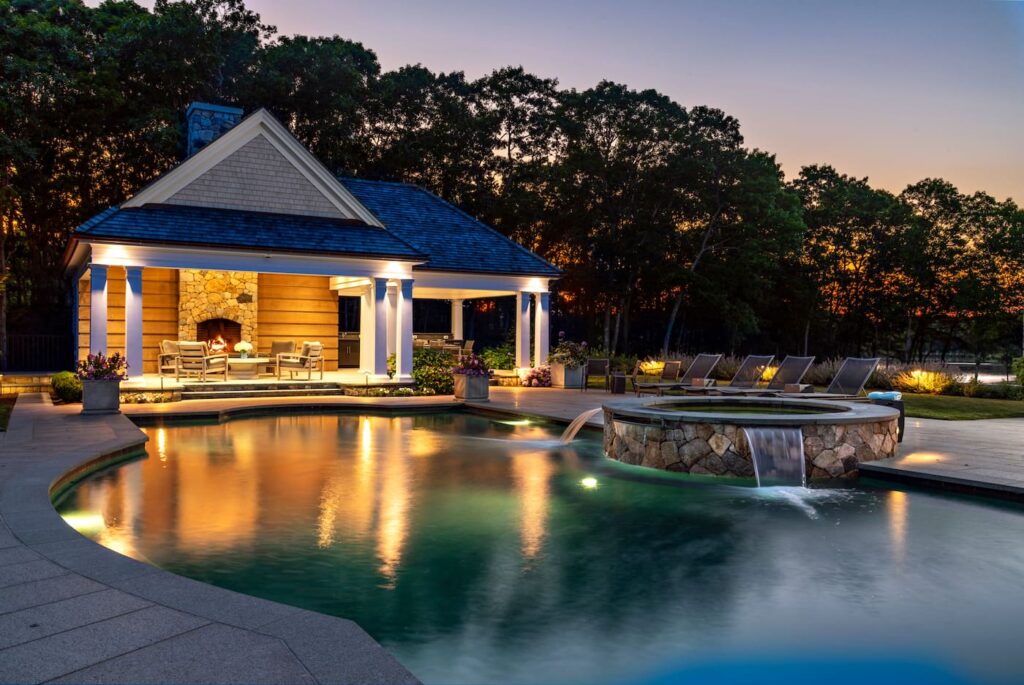 Architectural cabana integrated with a custom pool