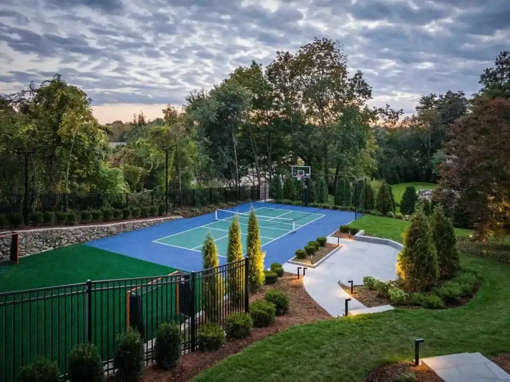 Sport court integrated into an outdoor living property